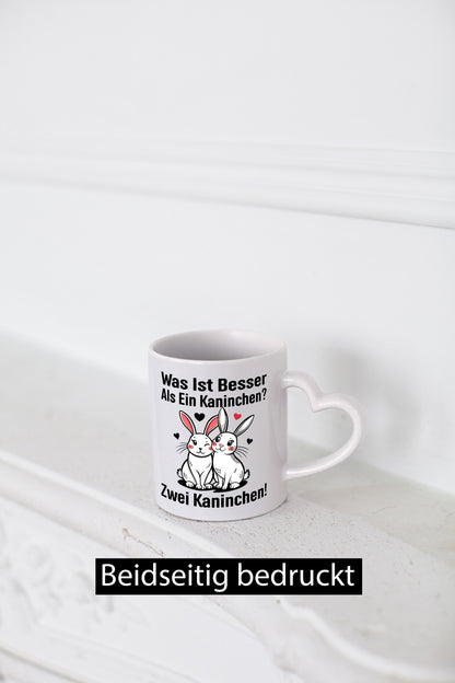 Was ist besser als 1 Kaninchen | Süßes Humor Geschenkidee Tasse