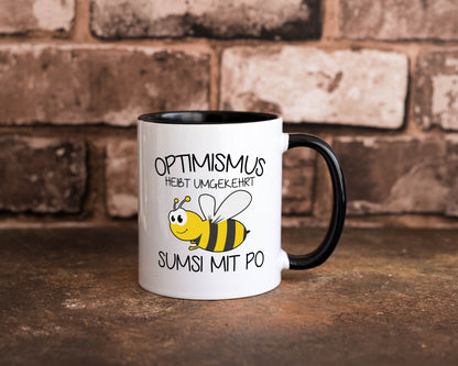 Optimismus umgekehrt heißt Sumsimitpo | Biene lustiger Spruch Geschenk Humor Tasse