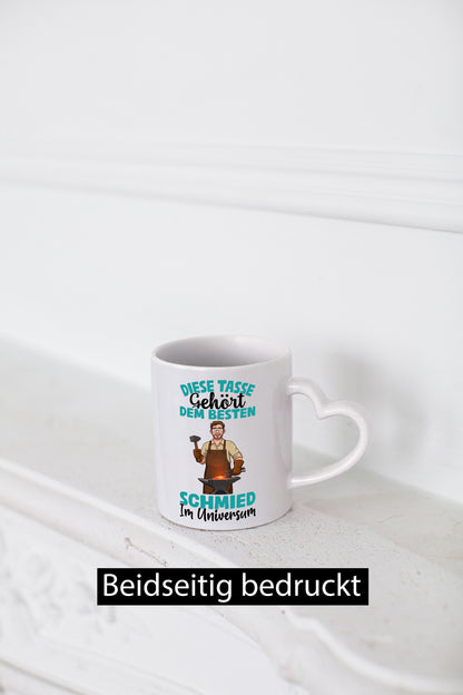 Im Universum: Schmied | schmieden lustig Humor Geschenkidee Geschenk Tasse